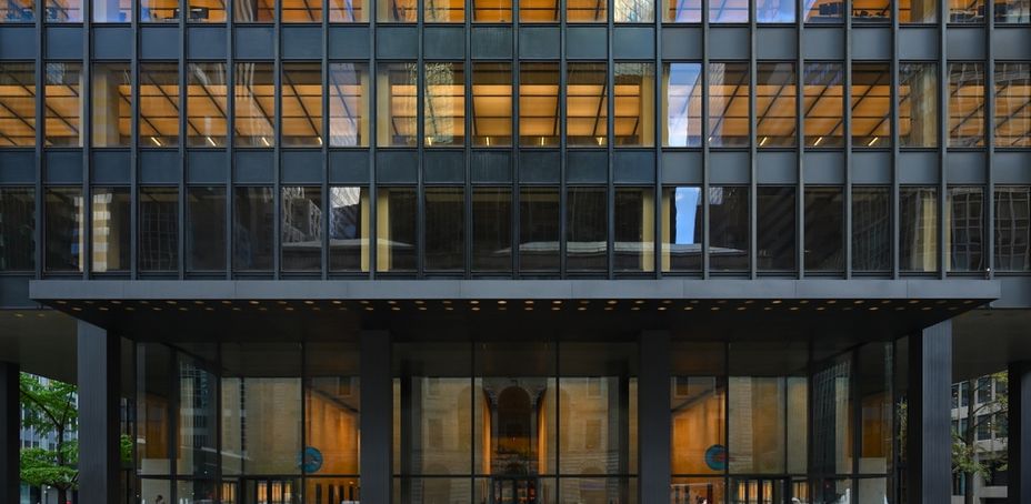 Modern architectural marvel of the Seagram Building featuring glass facade and a grand entrance.