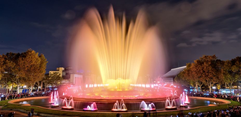 The famous Magic Fountain light show at night. Plaza Espanya in Barcelona, Spain