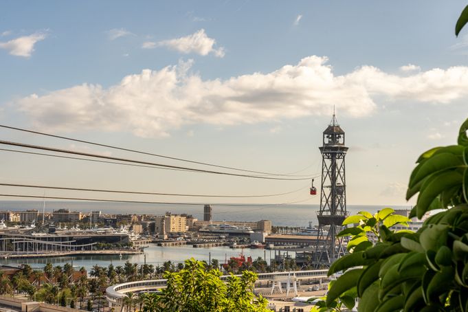 Panoramic view of Barcelona's cable car and Port Vell from Montjuïc